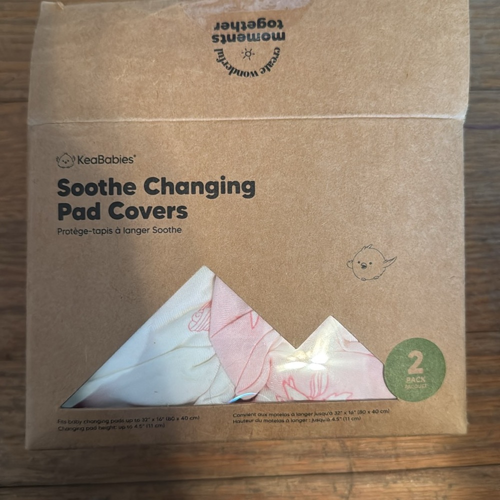 NWT changing mat covers